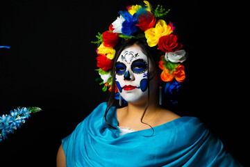 Woman personified as catrina on the day of the dead 