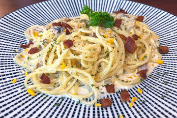 Spaghetti with pancetta. Hard parmesan cheese and cream sauce. Traditional italian cuisine. Pasta alla carbonara