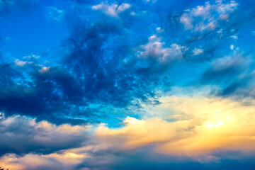 Naklejka na ściany i meble Stunning clouds covering the day skies