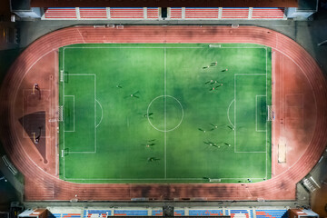 High above top down view of football stadium at night © ilyaska