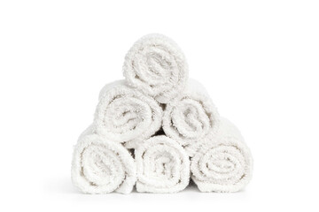 stack of white clean towels rolled up on white background