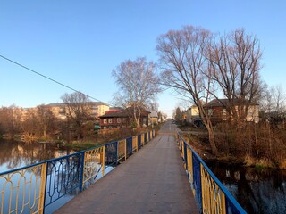 river autumn shore trees sky clouds reflection black branches branches unzha bridge view from the bridge horizon panorama nature of autumn