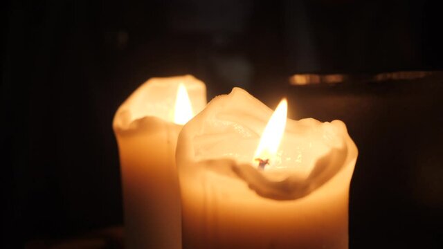 Mystical wax candles on the sorcerer's table