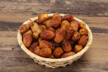 Sweet tasty dry dates in the basket