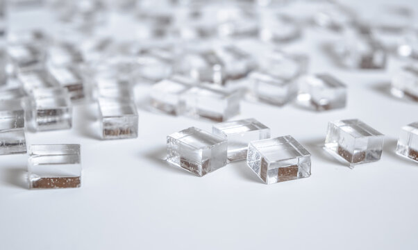 abstract plastic parallelepipedic shapes on a white background