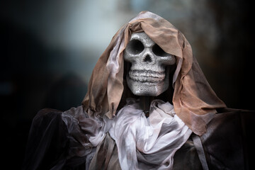 Fototapeta na wymiar stone skull. Ghost decorations for Halloween, filter style.