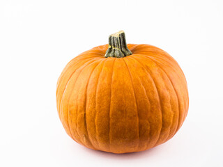 Fresh organic pumpkin on a white background. Halloween pumpkin on a white background. Ripe orange pumpkin on a white background.