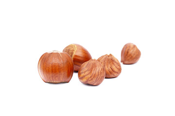 Group fresh hazelnuts isolated on white background