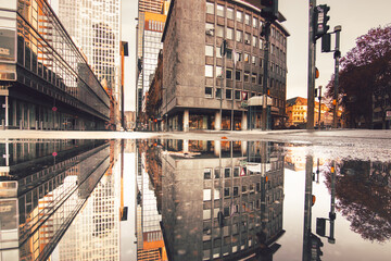 Reflections in Frankfurt am Main. Great reflection in puddles. The city, skyscrapers and streets...