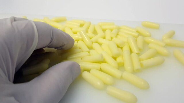 Yellow glycerin suppositories. Quality control in pharmacy lab.