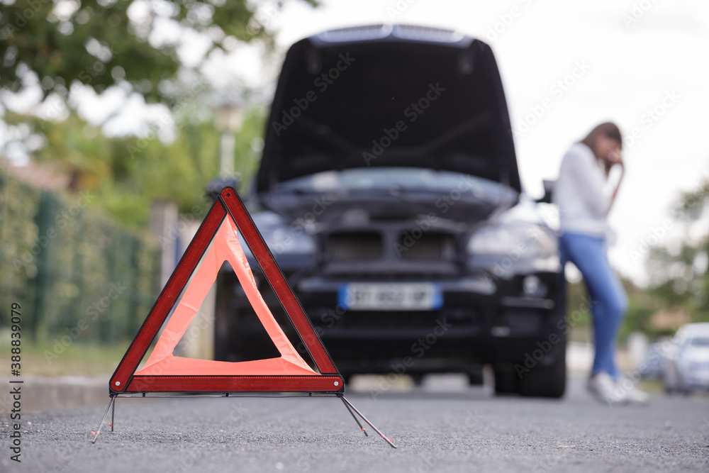 Wall mural close up on triangle warning sign