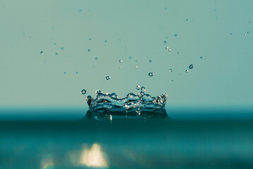 Water drop splash close-up. Crown.