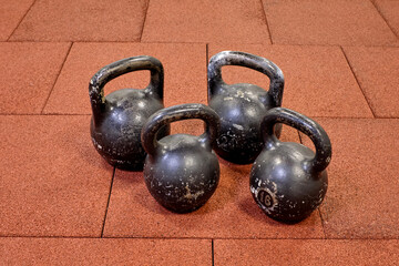 Naklejka na ściany i meble kettlebell weights on rubber floor ready for strength and conditioning workout