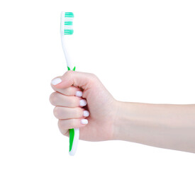 Green tooth brush in hand on white background isolation