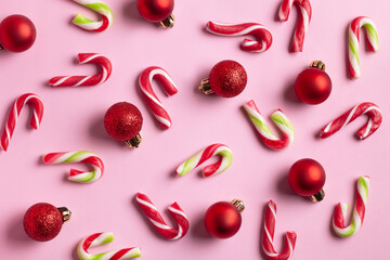 Christmas background of candy cane and christmas balls