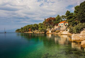 Fototapeta na wymiar Idyllic turquoise beach in Splitska, village on Brac island, Croatia. Long exposure, august 2020