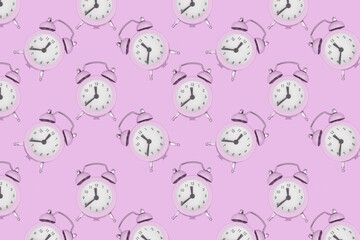 Background from alarm clocks. Antique alarm clocks. Pattern. Top view.