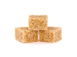 Brown sugar cubes isolated on white
