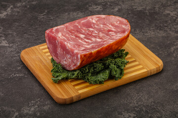 Beef ham piece over board