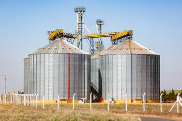 Fototapeta na wymiar Grain dryer over blue sky background, Brazil.