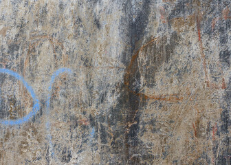 An old scratched gray dirty concrete wall.
