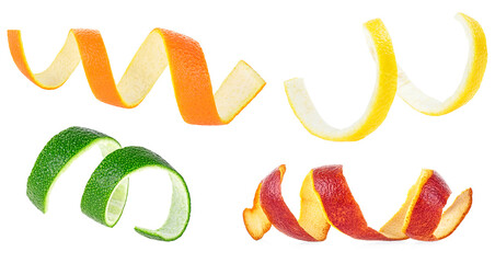 Twisted peel of Sicilian orange, lemon, orange and lime isolated on a white background. Set of images.