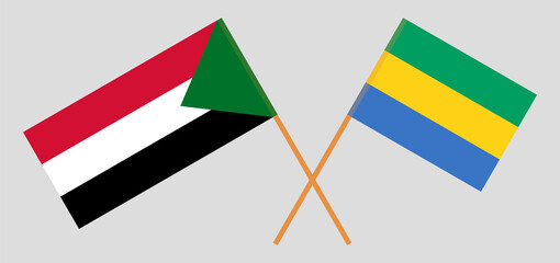 Crossed flags of Gabon and Sudan