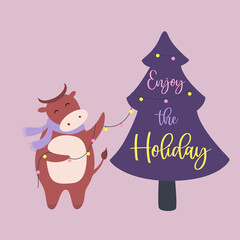 Bull character with scarf, decorates Christmas tree. Enjoy the holiday quote. Hand drawn vector animal with garland. Winter holiday greeting card, poster design. Color cow new year 2021 symbol