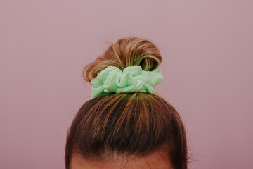 emale hair tied with scrunchie
