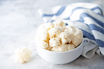 Fresh raw cauliflower in a white bowl