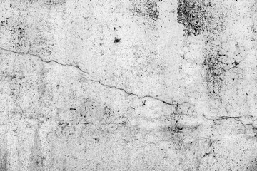 Texture of a concrete wall with cracks and scratches which can be used as a background