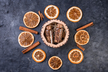 New Year's set for mulled wine in a wood box. Fragrant spices, orange peel, cinnamon sticks, badyan.