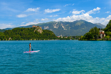 Young Woman Relaxing on Stand Up Paddle
