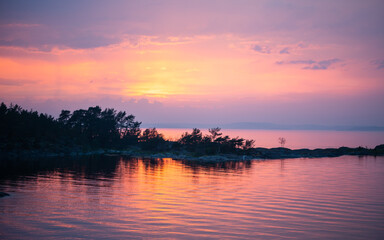 Fototapeta na wymiar Beautiful sunset over a bay in the Baltic Sea