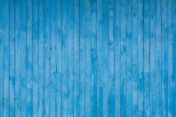 Wood background. Old blue vertical boards