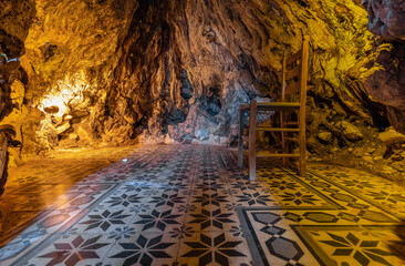 The tiny church of Panagia Plataniotissa (All Holy Virgin of the Plane Tree) built  inside the...