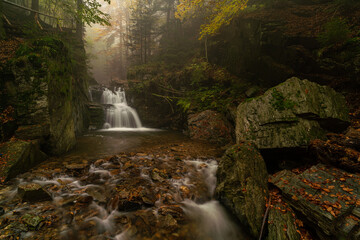 waterfall in autumn forest