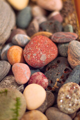 image of a set of stones from the sea and river of different colors. Stones wallpaper. Relax 
