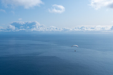 paraglider over the sea