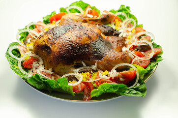 Roasted British large chicken with classic pork, sage, and onion stuffing served with little gem lettuce, tomato, and  fresh onion