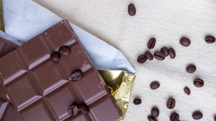 Photo of chocolate bar, coffee beans