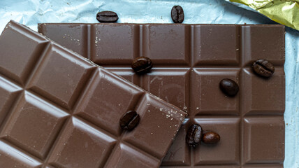 Photo of chocolate bar, coffee beans