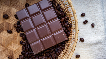 Photo of chocolate bar, coffee beans