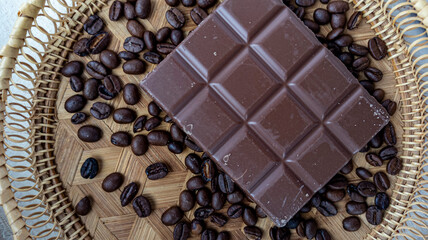 Photo of chocolate bar, coffee beans
