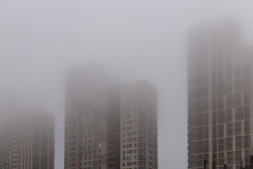 High rise buildings in deep fog
