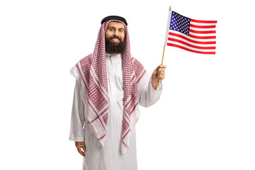 Happy arab man in a thobe waving a USA flag