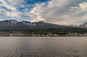 Ushuaia, Tierra del Fuego, Argentina - December 13, 2008: Wide landscape, Twilight town behind...