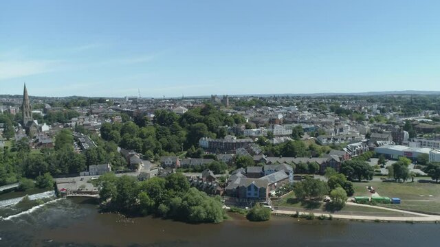 Rising aerial from the south side of the river exe facing the city centre. Cathedrak dominates the landscape