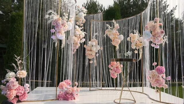 Wooden wedding hall is decorated with wedding decor. Beautiful wedding