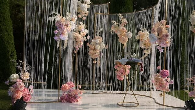 Wooden wedding hall is decorated with wedding decor. Beautiful wedding